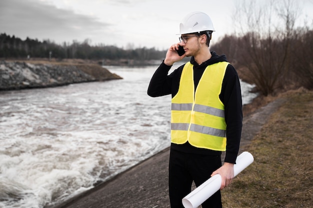 Site water movement survey with level equipment and test pit